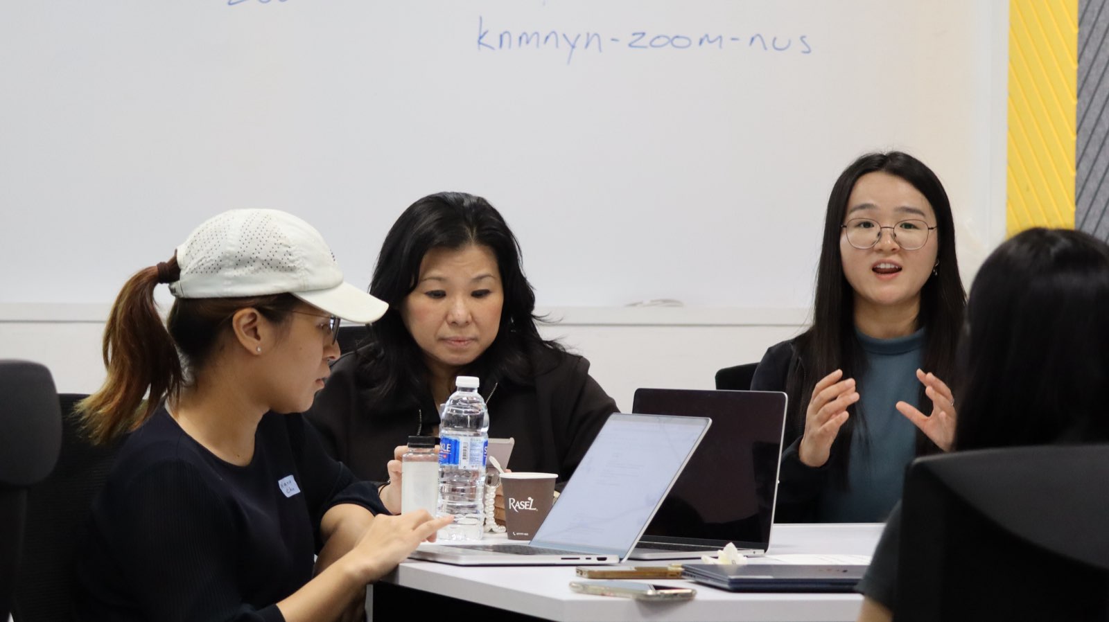 Attendees in conversation between sessions