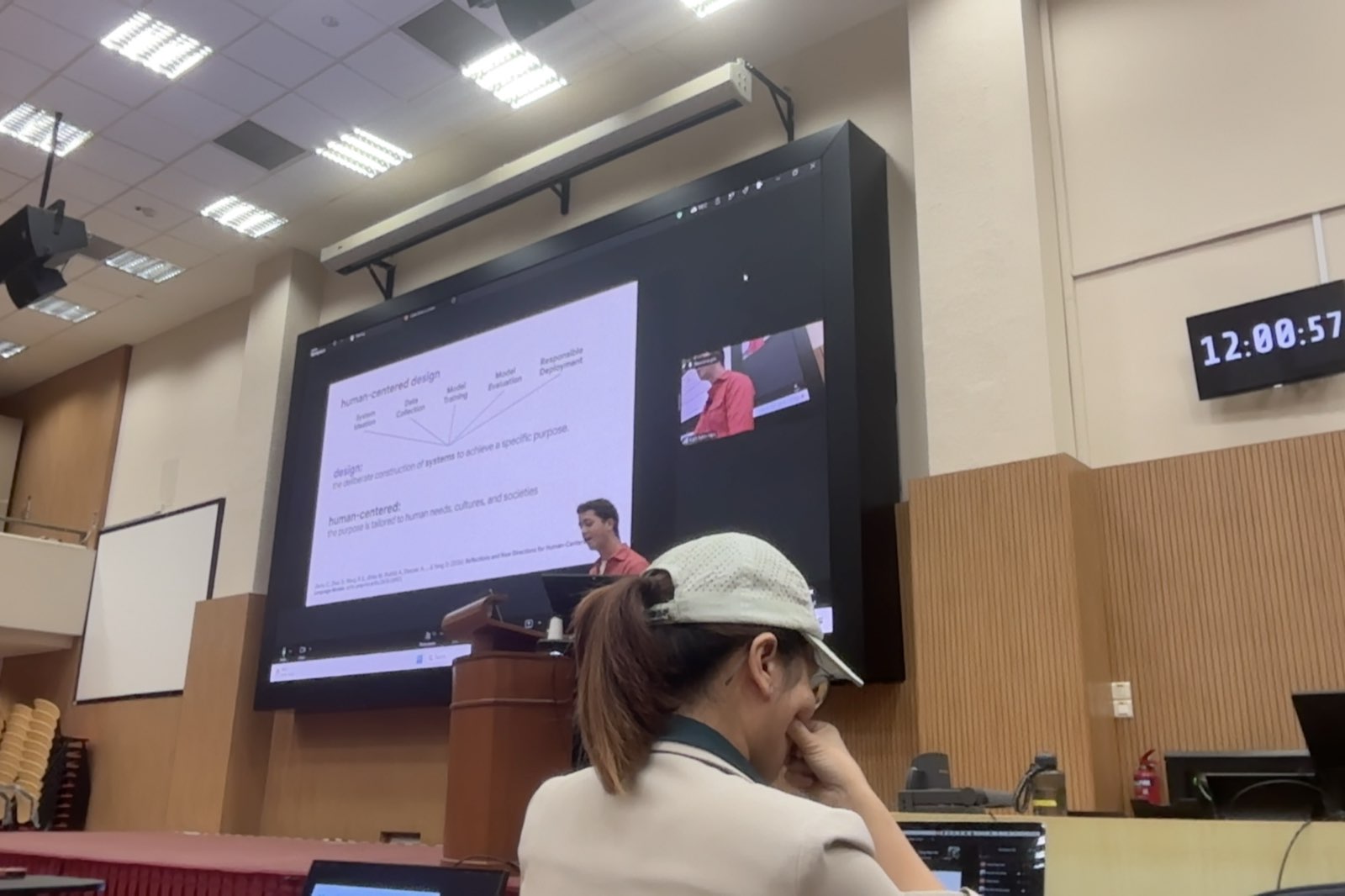 Speaker presenting on human-centered AI design